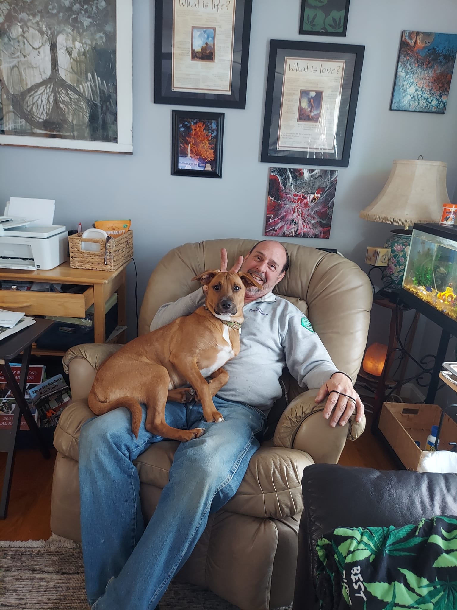 Jason having quality time with his dog, Artie
